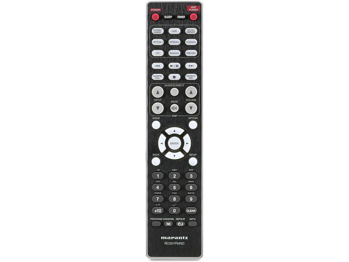 Télécommande noire Marantz RC001PMND, touches blanches et rouges, écran LCD, boutons de navigation et de contrôle